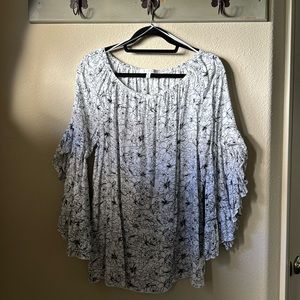 Black and white floral print blouse.